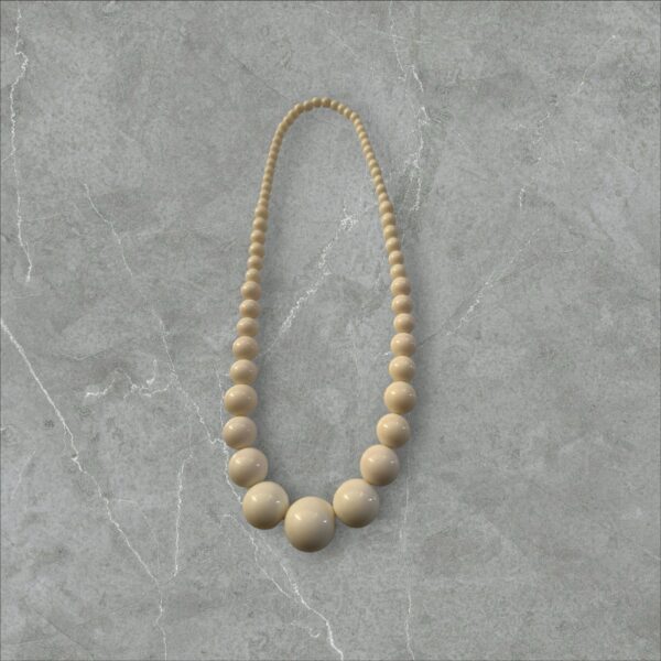 Simple plastic, hookless beaded necklace